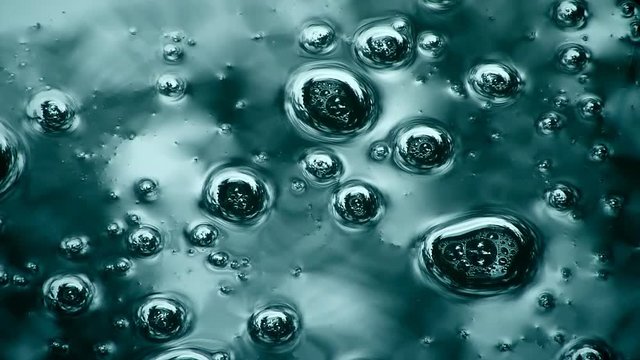 Mirror like water surface with bubbles
