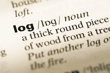 Obraz premium Close up of old English dictionary page with word log