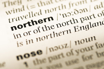 Fototapeta premium Close up of old English dictionary page with word northern
