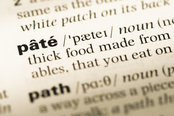 Fototapeta premium Close up of old English dictionary page with word pate
