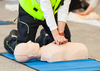 CPR training with dummy - 110245928