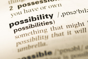 Close up of old English dictionary page with word possibility