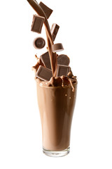 Pouring chocolate and chocolate milk into glass with splashing., Isolated white background.