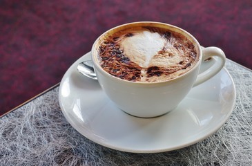 A cup of warm cappucino 