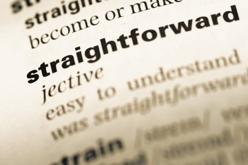 Fototapeta premium Close up of old English dictionary page with word straightforwar