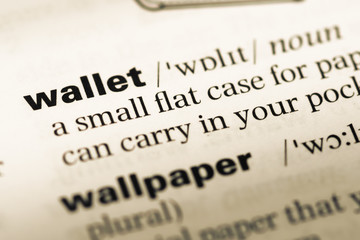 Close up of old English dictionary page with word wallet