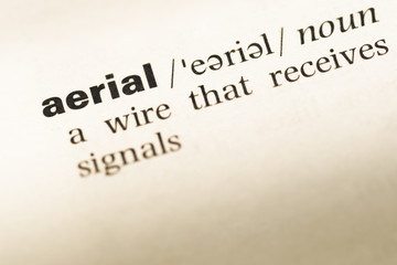 Obraz premium Close up of old English dictionary page with word aerial