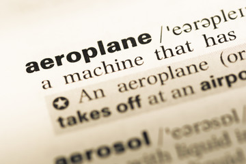 Close up of old English dictionary page with word aeroplane
