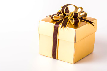 Golden gift box isolated on white background