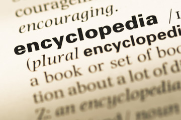 Obraz premium Close up of old English dictionary page with word encyclopedia