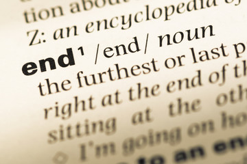 Obraz premium Close up of old English dictionary page with word end