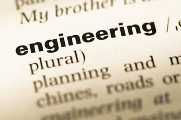 Obraz premium Close up of old English dictionary page with word engineering