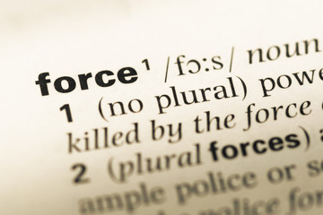 Close up of old English dictionary page with word force