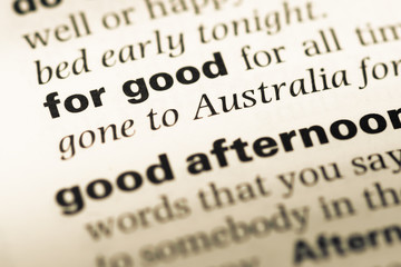 Close up of old English dictionary page with word for good