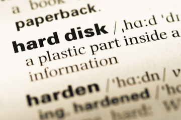 Close up of old English dictionary page with word hard disk