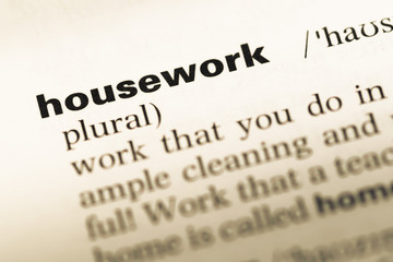Close up of old English dictionary page with word housework
