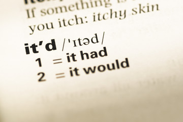 Close up of old English dictionary page with word it'd