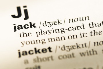 Obraz premium Close up of old English dictionary page with word jack