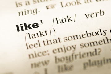 Close up of old English dictionary page with word like