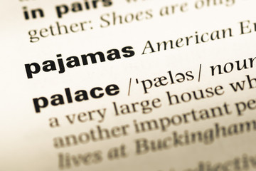 Close up of old English dictionary page with word pajamas