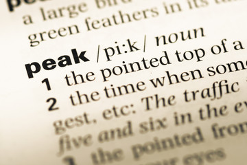 Fototapeta premium Close up of old English dictionary page with word peak