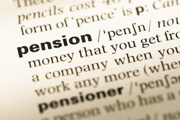 Obraz premium Close up of old English dictionary page with word pension