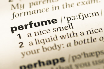 Fototapeta premium Close up of old English dictionary page with word perfume