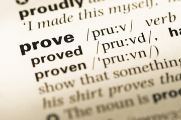 Fototapeta premium Close up of old English dictionary page with word prove