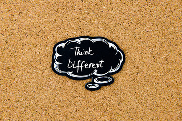THINK DIFFERENT written on black thinking bubble