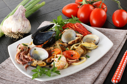 Italian pasta with seafood, mussels, clams, shrimp and squid