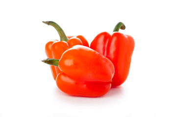 peppers over white background