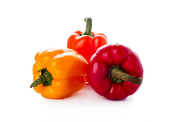 peppers over white background