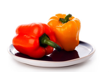 peppers over white background