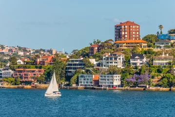 Poster Im Rahmen Exclusive homes along Sydney Harbor © Val Traveller