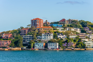 Fototapeta na wymiar Exclusive homes along Sydney Harbor