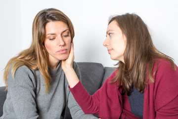 woman helping a female friend over divorce