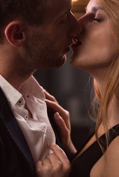 Portrait of sexy couple kissing
