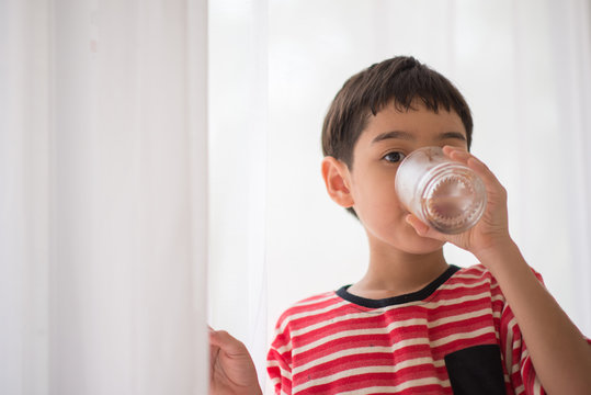 Little Boy Drinking Water