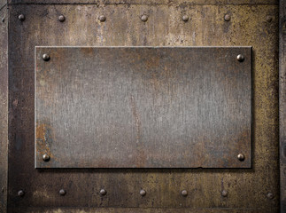 grunge metal plate over rusty background