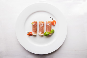 Black forest ham on white plate