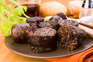 pieces of fried black pudding on dish gray