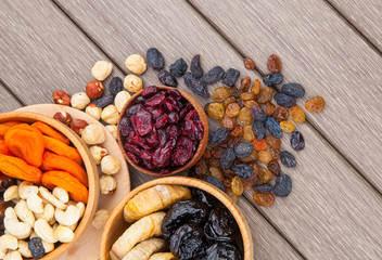 Dried fruits in wooden bowl