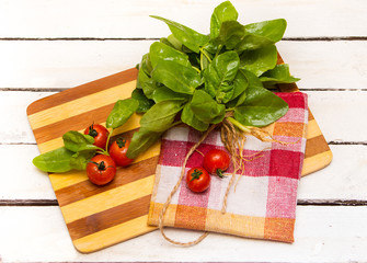 Fresh spinach and cherry tomatoes