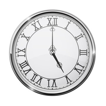 Clock dial with roman numerals. Five o'clock