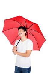 Young man holding umbrella