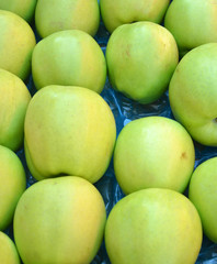 ripe apples  for sale in a display crate