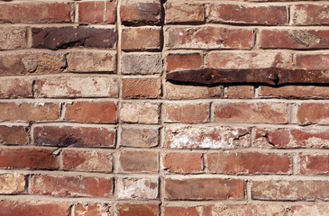 Old red brick wall texture.