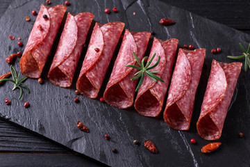 Delicious salami with basil and wine, selective focus - obrazy, fototapety, plakaty
