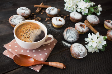Obraz na płótnie Canvas coffee cup, tasty seedcake and flower