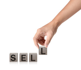 . Closeup  hand putting together word